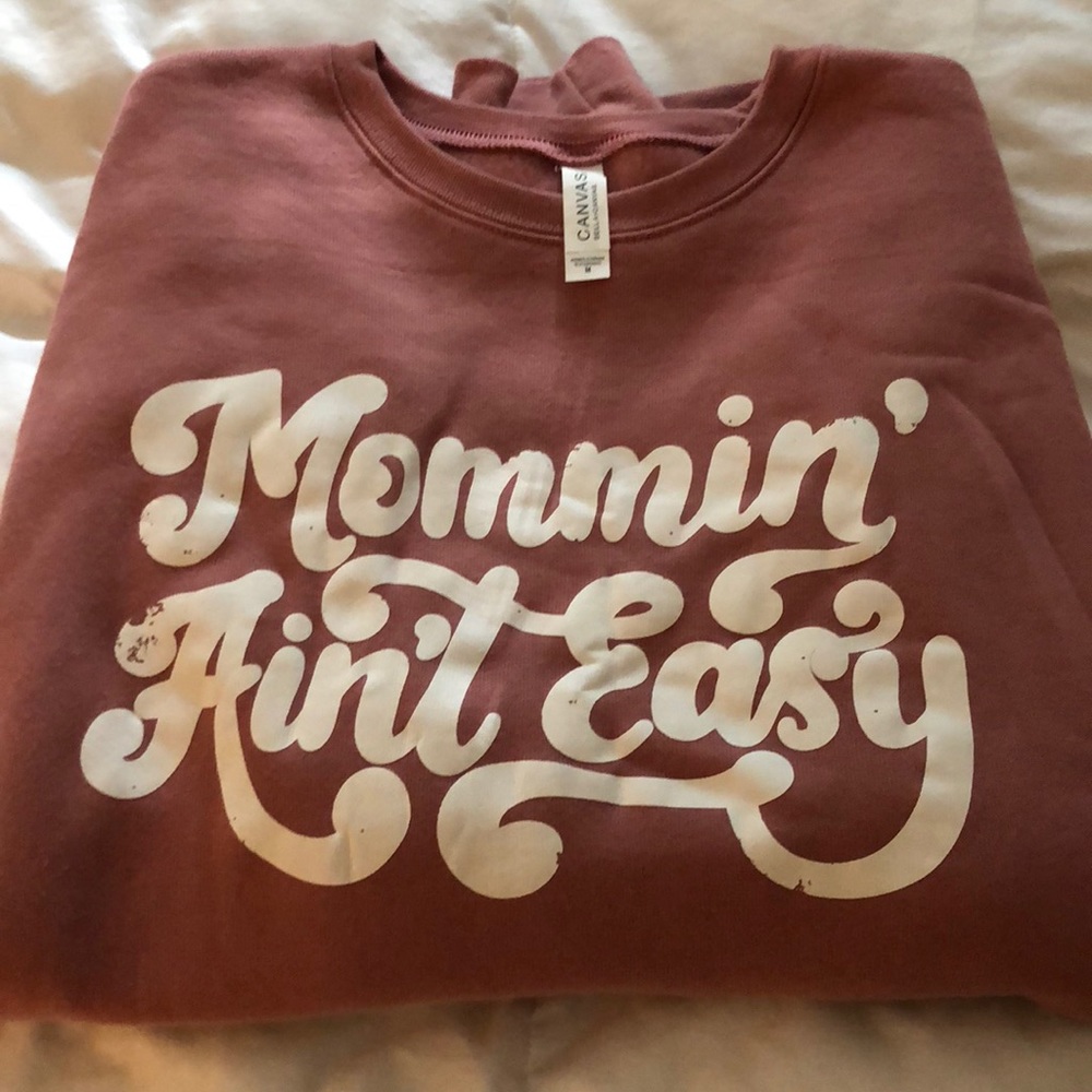 Mommin’ ain’t easy crew neck sweatshirt